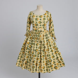 Vintage 1950s yellow rose print cotton dress with 3/4 length sleeves UK 8 S
