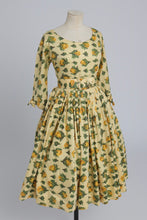 Load image into Gallery viewer, Vintage 1950s yellow rose print cotton dress with 3/4 length sleeves UK 8 S
