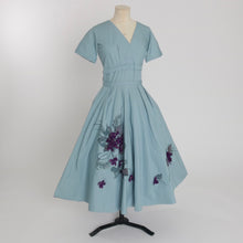 Load image into Gallery viewer, Vintage 1950s original blue floral print cotton dress with floral applique by Marjorie Montgomery UK 8 US 4 S
