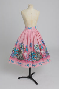 Vintage 1950s original novelty border print pink cotton skirt UK 10 S