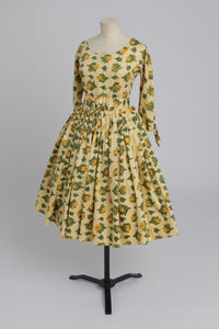 Vintage 1950s yellow rose print cotton dress with 3/4 length sleeves UK 8 S